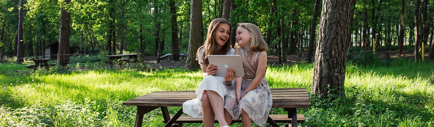 Children discovering plant information